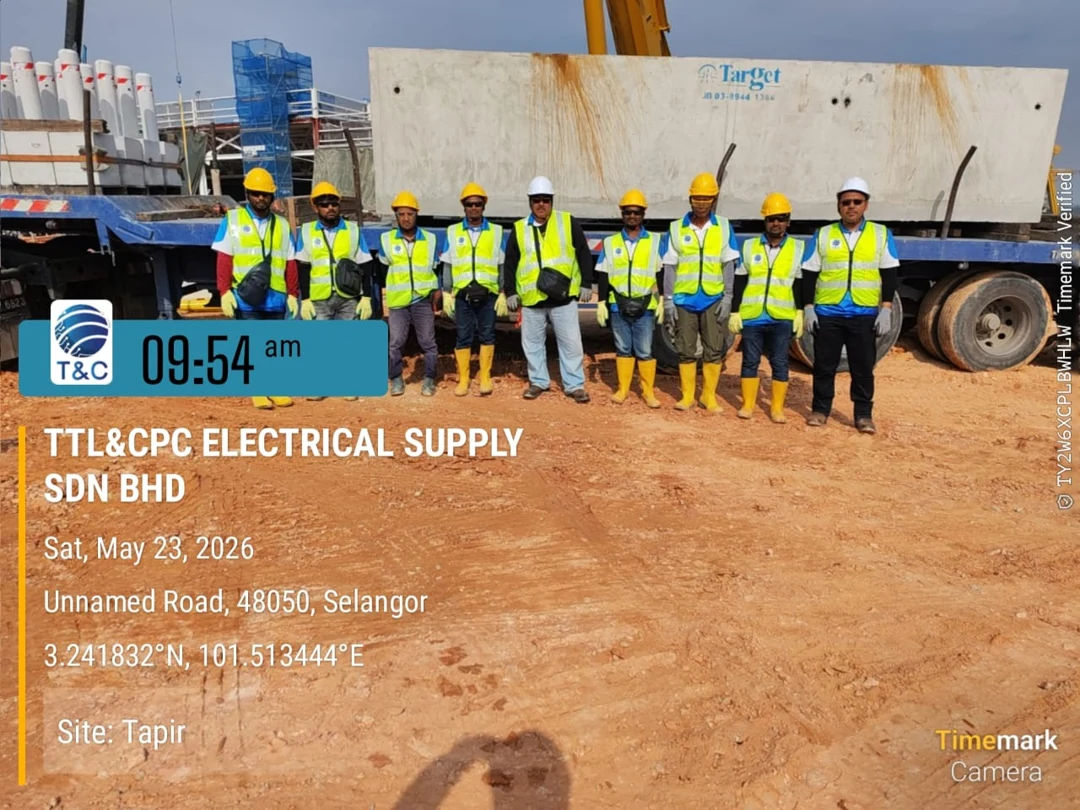 Site team and electrical equipment in the project reference.